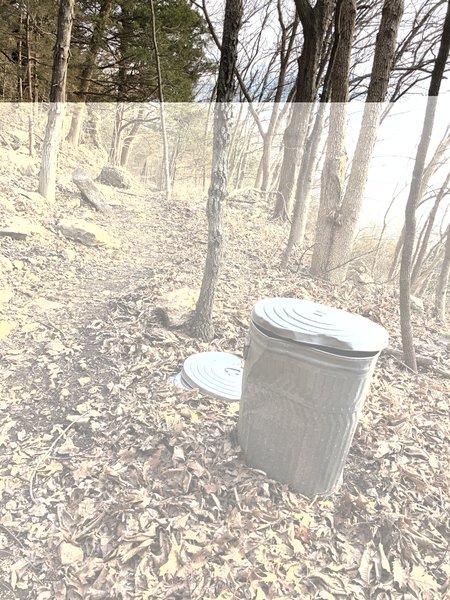 I don't think I've ever run across a trashcan along a trail in the woods...people are definitely using though!  Who dumps this thing?!?  :D