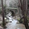 Old bridge at the bottom of the valley.