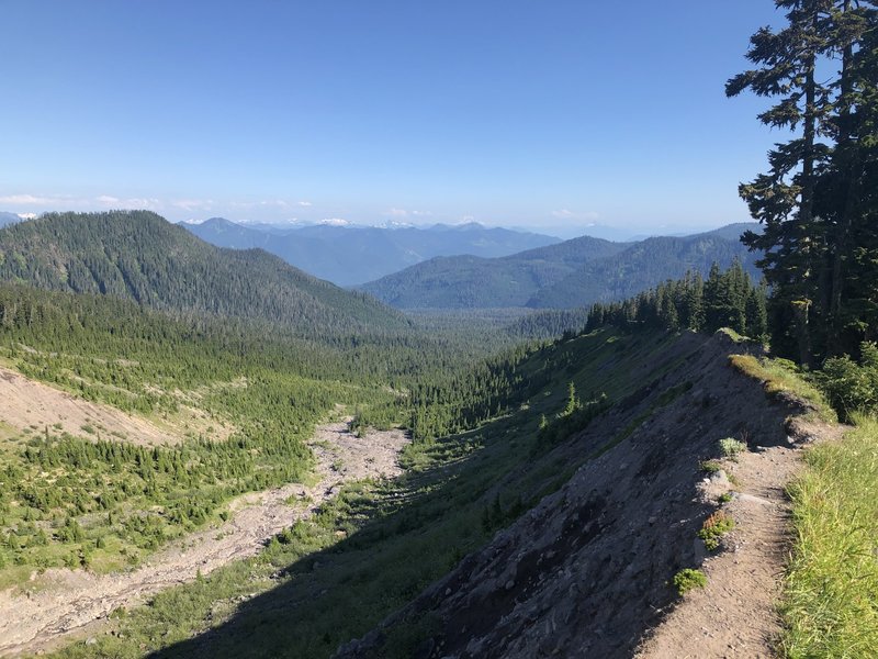 The trail as it passes above the treeline, overlooking the valley below.