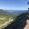 The trail as it passes above the treeline, overlooking the valley below.