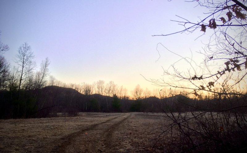 Trail continues up along the Holyoke Range ridge in the background.