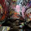 Inside the cave, lots of graffiti