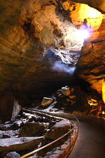 Mist hovering from lights inside the route of Natural Entrance