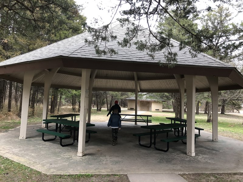 West side park shelter and restrooms in the background.