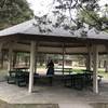 West side park shelter and restrooms in the background.