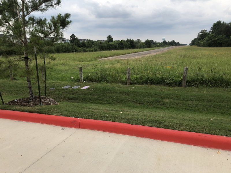 Access to western end of Addicks Dam Road Southwest from business at the corner of Park Row and Greenhouse.