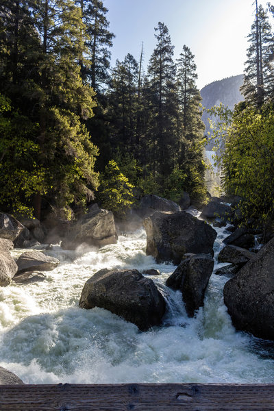 A glimpse of Vernal Falls as the sun just rises above the ridge