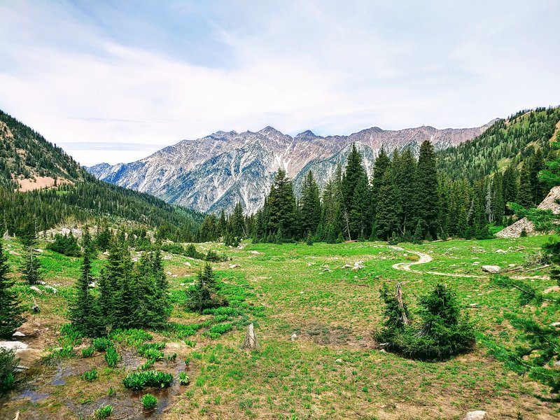 Beautiful mountain valley looking back towards O'Sullivan Peak, Twin Peaks, Dromedary Peak.