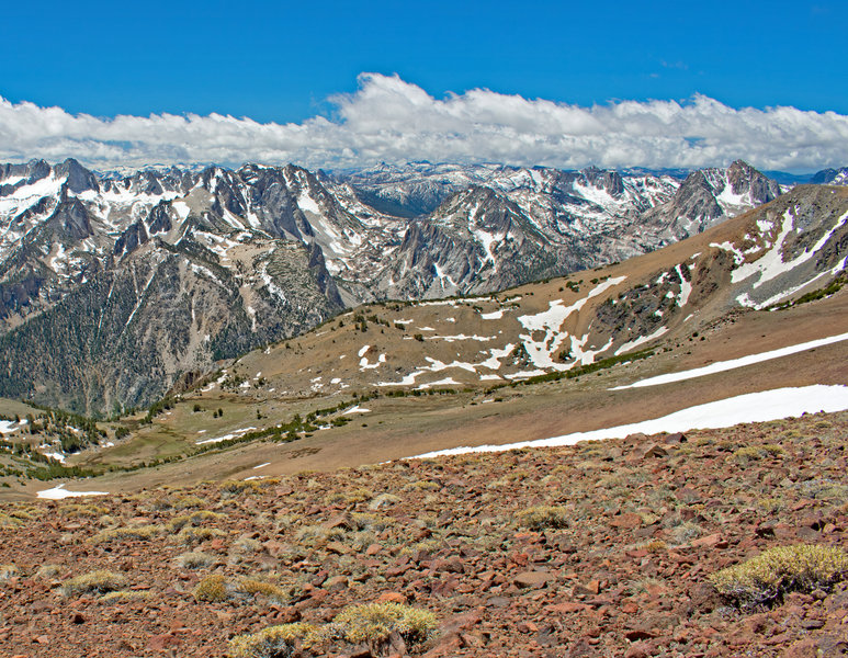 Shows route down from Victoria Peak (exterme right) to the bowl. While the terrain is sometimes steep, there are no rocky drop-offs or large blocks of talus that are typical of high Sierra Peaks. View looks over Sawtooth Ridge into Yosemite.