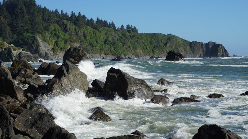 Waves crashing on the rocks below the aptly named Rocky Point.