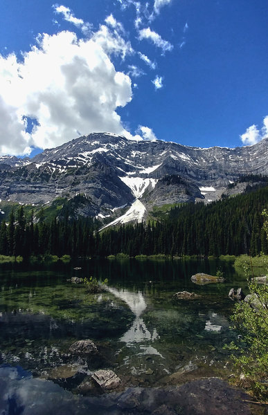 Warspite Lake with mountains behind