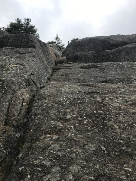 Scrambling up to the summit of Bald Mountain