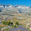 Rick from Sonoma climbing Puppet Pass with Glacier Divide in the background. Mesa Lake is on the extreme left.