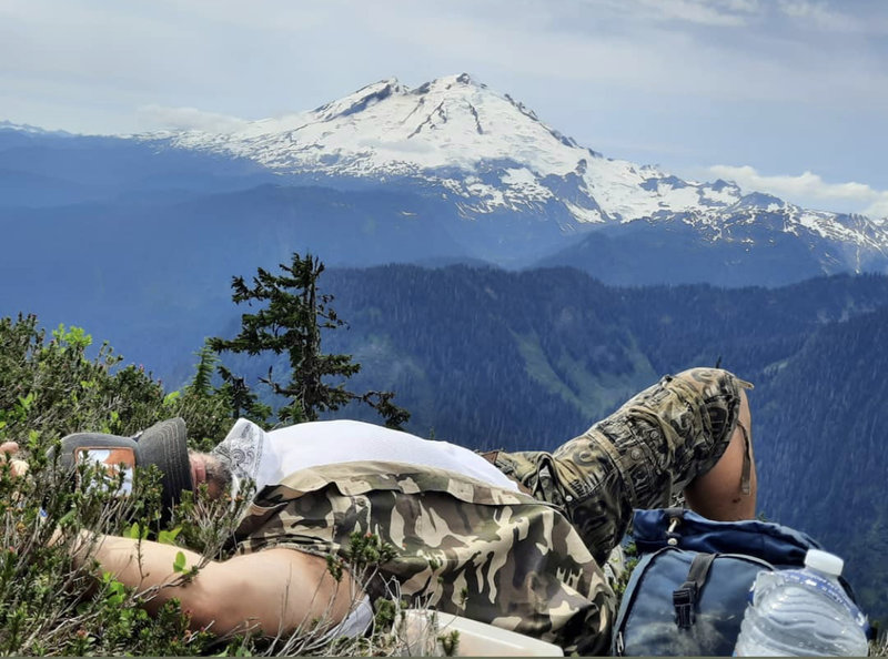 Power nap just off Shannon Ridge trail, with view of Mt. Baker.