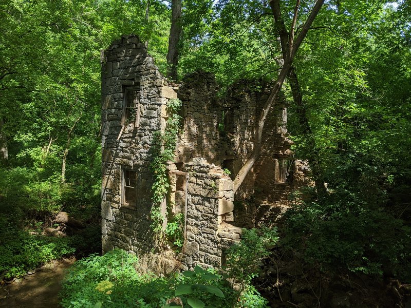 Ruins of an old flour mill down a 20 yard spur