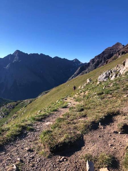 Ascending Buckskin Pass on the 4 Pass Loop in Maroon Bells Wilderness.