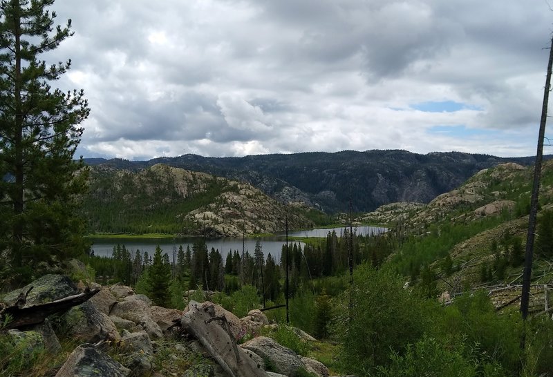 Lake Ethel is set in a rocky basin, as seen from the north on Lake Ethel Trail.