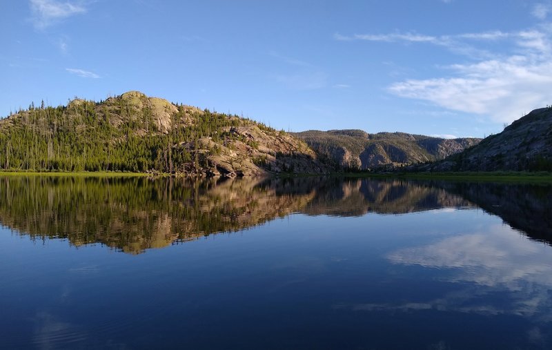 Reflections on Lake Ethel as the sun sets on a quiet July evening.