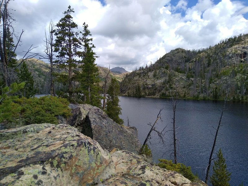 Passing Lake Christina in its rocky basin, on Lake Ethel Trail.