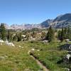 Bald Mountain Basin and the mountains to the north are seen from the CDT/Fremont Trail. Mountains left to right - Mt. Lester's two peaks, distant mountains with Titcomb Basin on other side, and ridge of unamed peaks on the northeast side of this Basin..