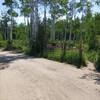 Trail entrance at open gate to Dry Lake Campground