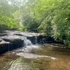 Little creek accesses are common along the Sand Spring Trail, with small water features like this waterfall.