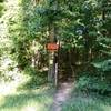 Sign stating, there is 60 miles of trails to Falls Lake Dam.