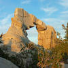 Arch Rock in the morning light. The opening is about 30 feet tall and the entire formation may be 40 - 50 feet tall.