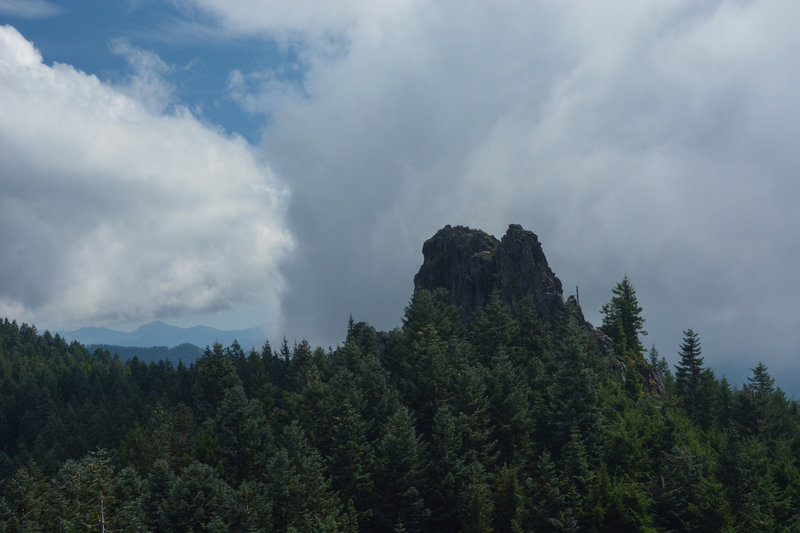 Rooster Rock as seen from the stop of Chicken Rock on a cloudy day.