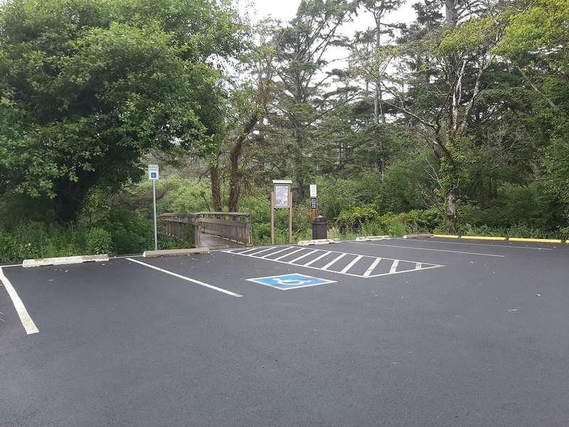 Parking area at the trailhead, paved with handicap spots.