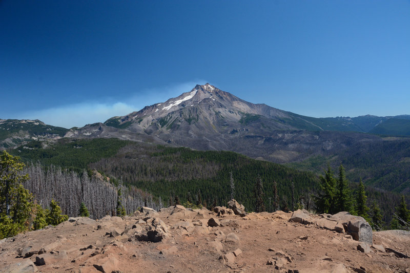 Mount Jefferson from the summit of Triangulation Peak with the fire form the 2020 Lionshead fire behind.