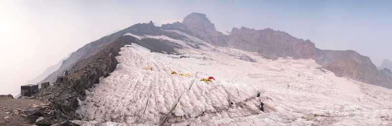 Diffused afternoon sun from wildfire haze surrounding base camp at Camp Muir.