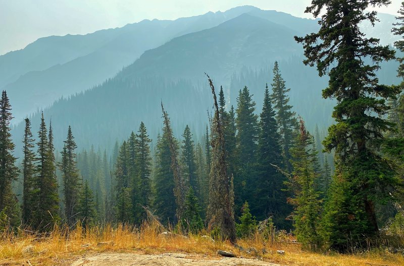 Layers of mountains in the smoke.