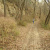 The trail runs along tall cliffs.