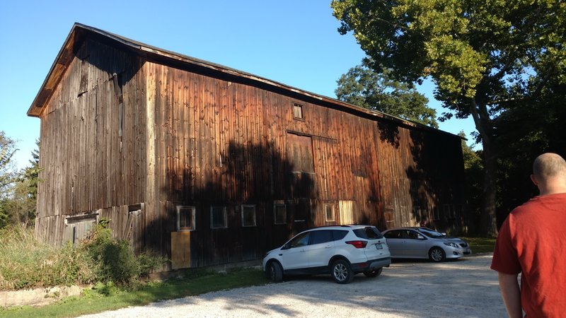 Barn at the Stanford House. Parking and trailhead is behind the barn.