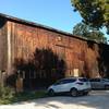 Barn at the Stanford House. Parking and trailhead is behind the barn.