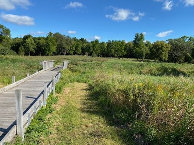 There are several wooden bridges along the trail where Otter Creek passes. When the photo was taken the creek was dry.