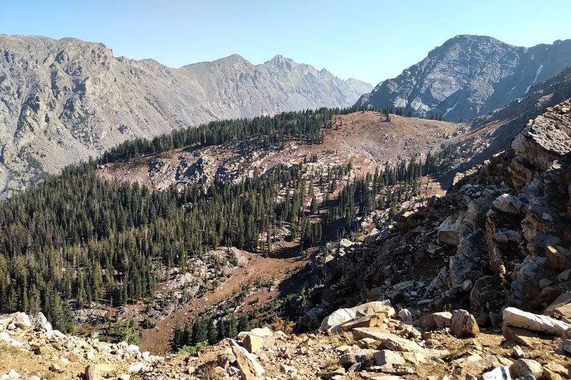 This is the top of the ridge that is the start of the NY Lake Trail. Your first step is straight ahead. Put your trekking poles in your pack as you'll need both hands.