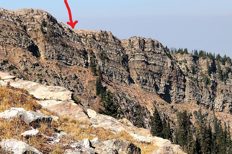 The arrow shows the beginning of the decent route on the New York Lake Trail, taken from the bottom of the headwall.