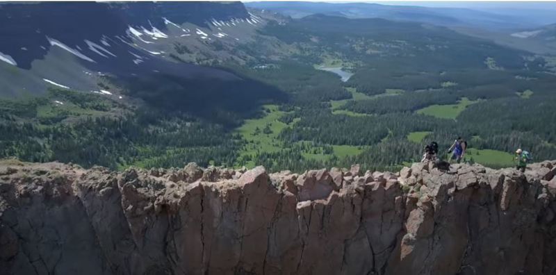 This was taken by a drone and shows the narrow trail with steep drops on both sides