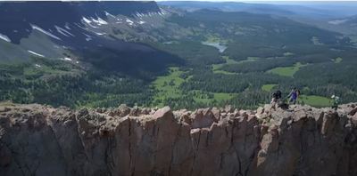 This was taken by a drone and shows the narrow trail with steep drops on both sides