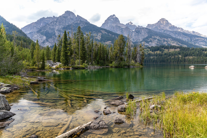 Taggart Lake with Nez Perce, Disappointment Peak, and Teewinot Mountain.