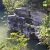 Beautiful rock face with resting log.