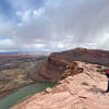 Distant showers sweep over the city of Moab.