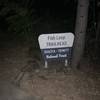 Trailhead at Packers Bay boat ramp parking lot.