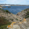 View of Cadqués midway between Sa Cebolla near Far de Cala Nans (Cala Nans lighthouse)