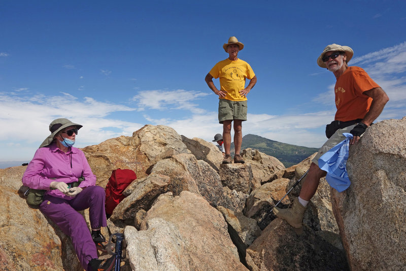 Hikers keeping six feet apart on Oakzanita peak during the time of coronavirus