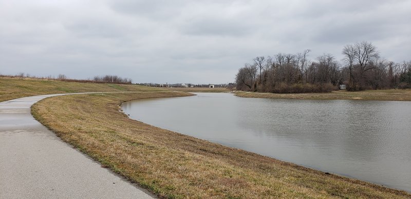 Path around the lake with drainage from the spring.