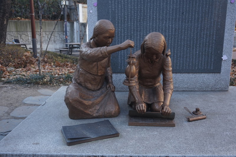 Statues on the Seoul City Wall Trail at Seosomun-ro  11-gil