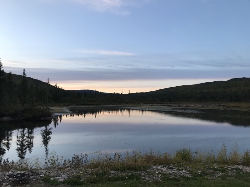 Alone at the lake while the sun goes down.